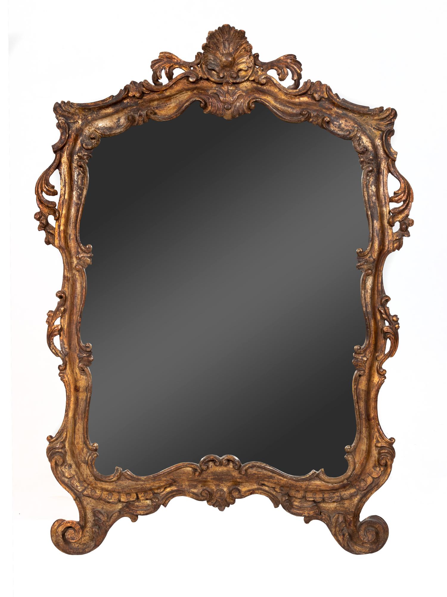 A Louis XV Style Carved Giltwood Mirror — LATE 18TH/EARLY 19TH CENTURY