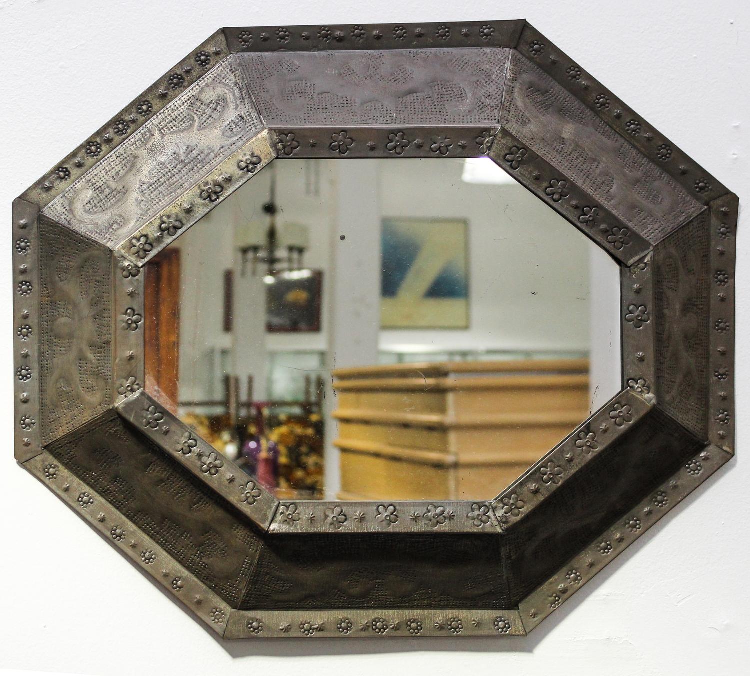 An Embossed Copper Mirror Height 18 1/4 x width 22 inches. — 20TH CENTURY