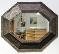 An Embossed Copper Mirror Height 18 1/4 x width 22 inches. — 20TH CENTURY