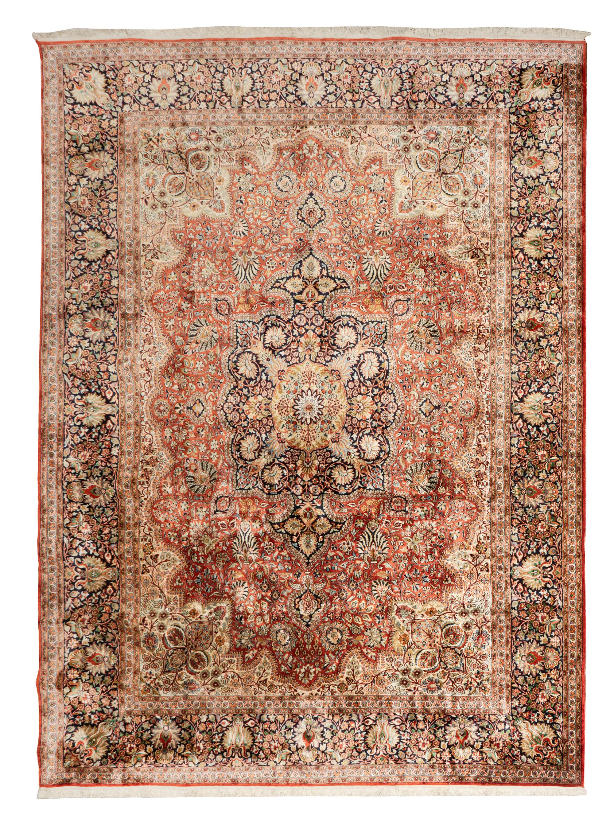 An Indo-Kashan Silk and Wool Rug