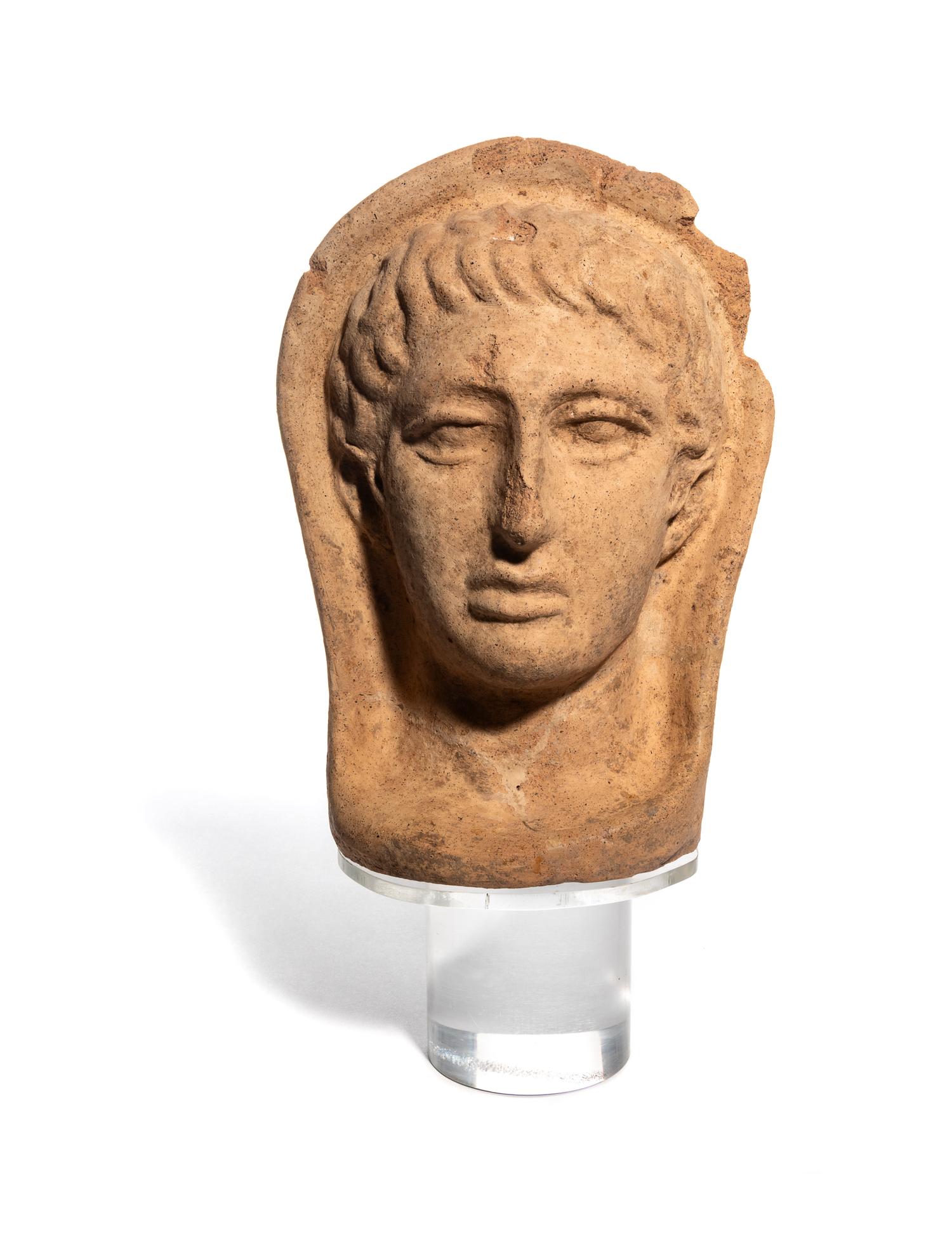 An Etruscan Terra Cotta Votive Head of a Man