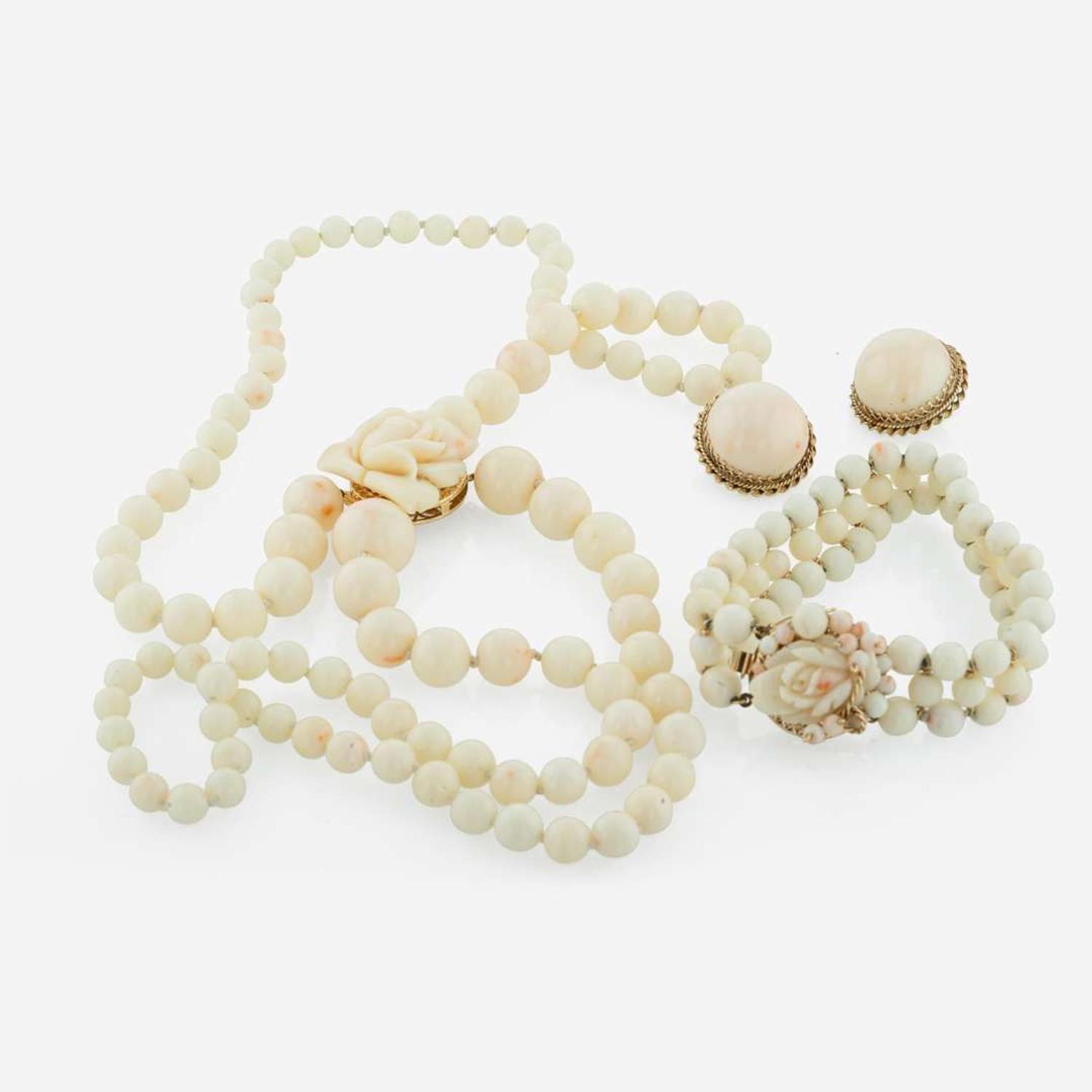 A Three Piece Collection of 14K Yellow Gold and Coral Jewelry