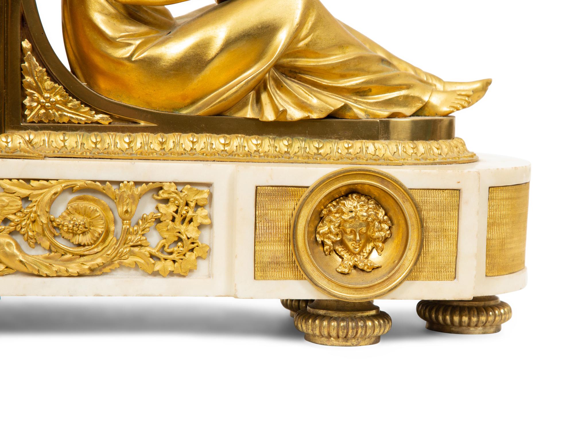 A Late Louis XVI Gilt Bronze and Marble Mantel Clock