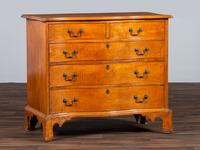 A Chippendale Style Tiger Maple Serpentine Chest of Drawers