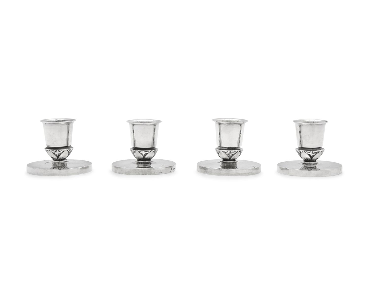 A Set of Four Gundorph Albertus Designed Georg Jensen Silver Cactus Pattern Candlesticks