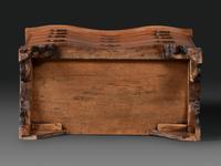 A Chippendale Cherrywood Reverse-Serpentine Chest of Drawers