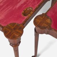 A pair of Queen Anne laburnum concertina action card tables circa 1715