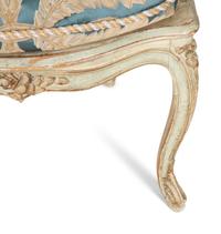A Pair of Louis XV Blue Painted Cane-Backed Fauteuils