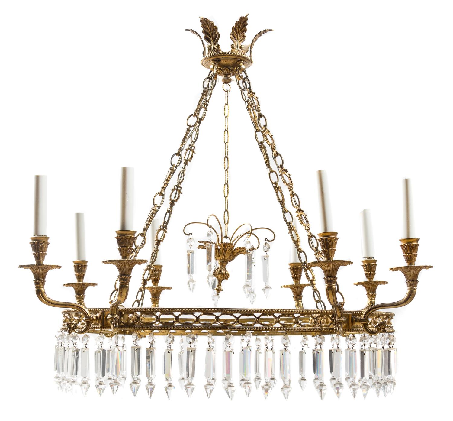 A Regency Style Gilt Metal Eight-Light Chandelier Height 29 x width 27 inches.