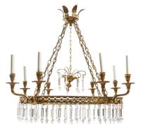 A Regency Style Gilt Metal Eight-Light Chandelier Height 29 x width 27 inches.