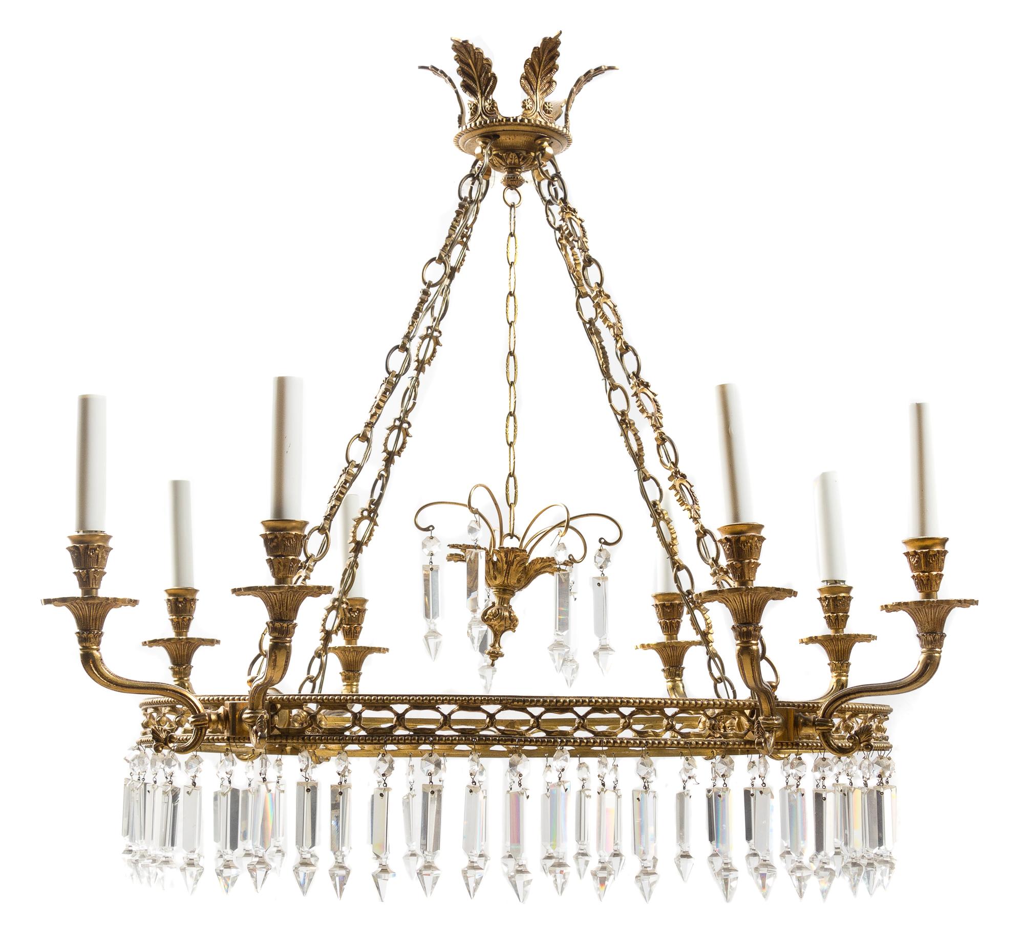 A Regency Style Gilt Metal Eight-Light Chandelier Height 29 x width 27 inches.