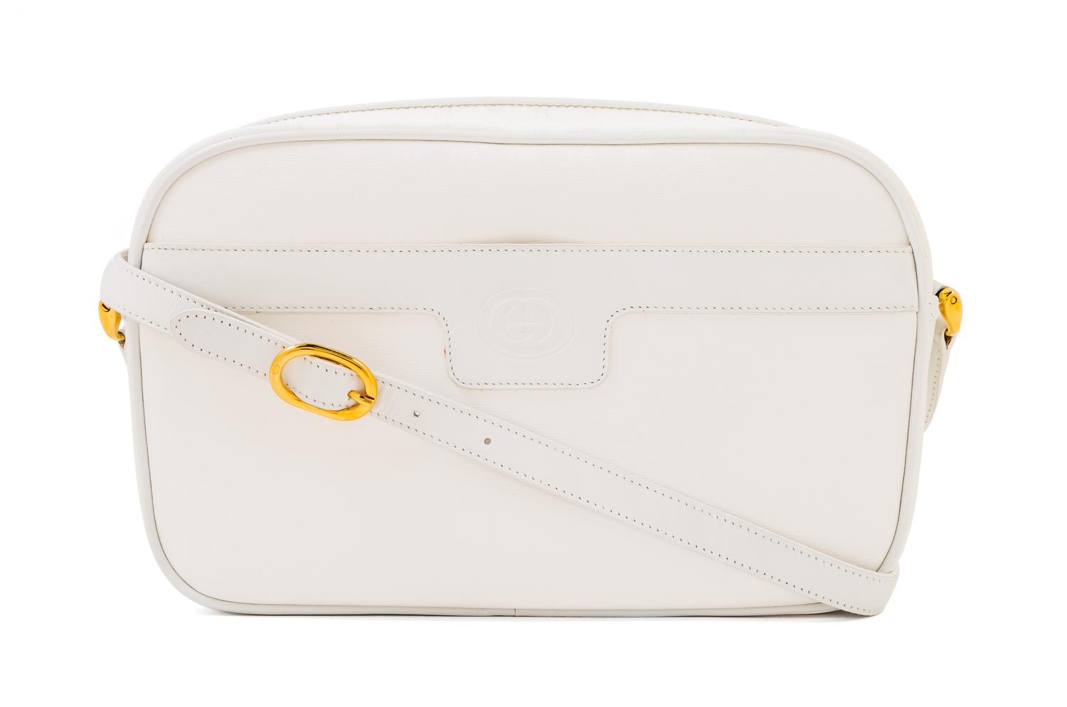 A Gucci White Monogram Canvas Handbag, 10" x 6.5" x 3"; Strap drop: 19".