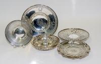 A Collection of American Reticulated Dishes and Baskets, Meriden Brittania Co., Meriden, CT, each having pierced decoration.