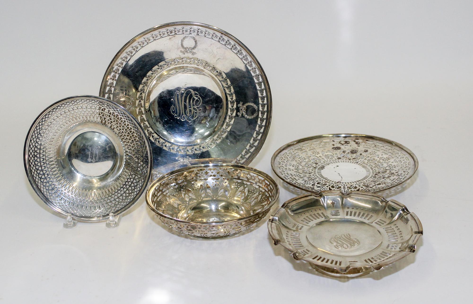 A Collection of American Reticulated Dishes and Baskets, Meriden Brittania Co., Meriden, CT, each having pierced decoration.