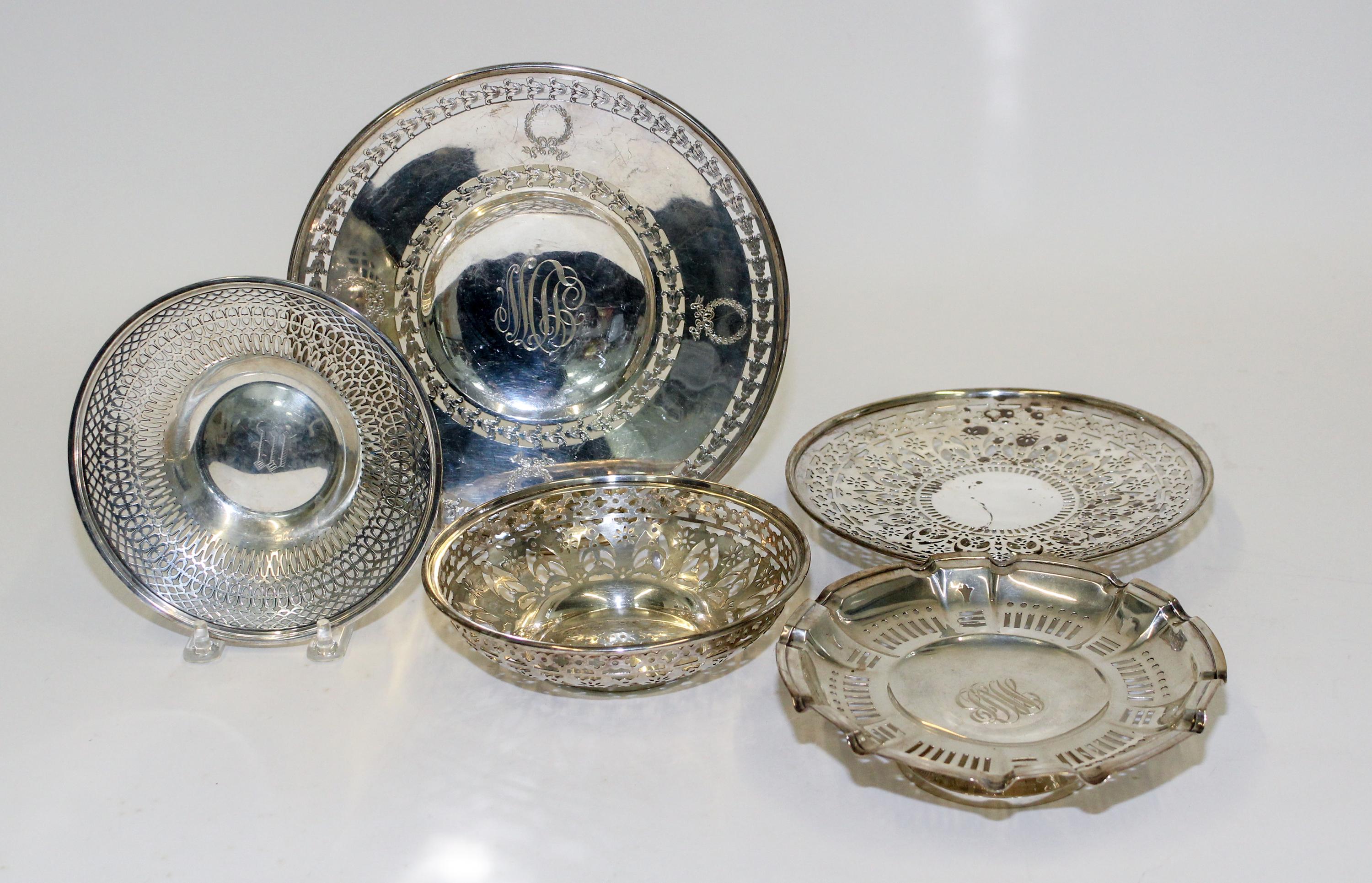 A Collection of American Reticulated Dishes and Baskets, Meriden Brittania Co., Meriden, CT, each having pierced decoration.