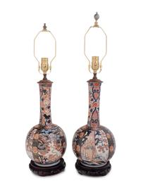 A Pair of Imari Palette Porcelain Bottle Vases Mounted as Lamps