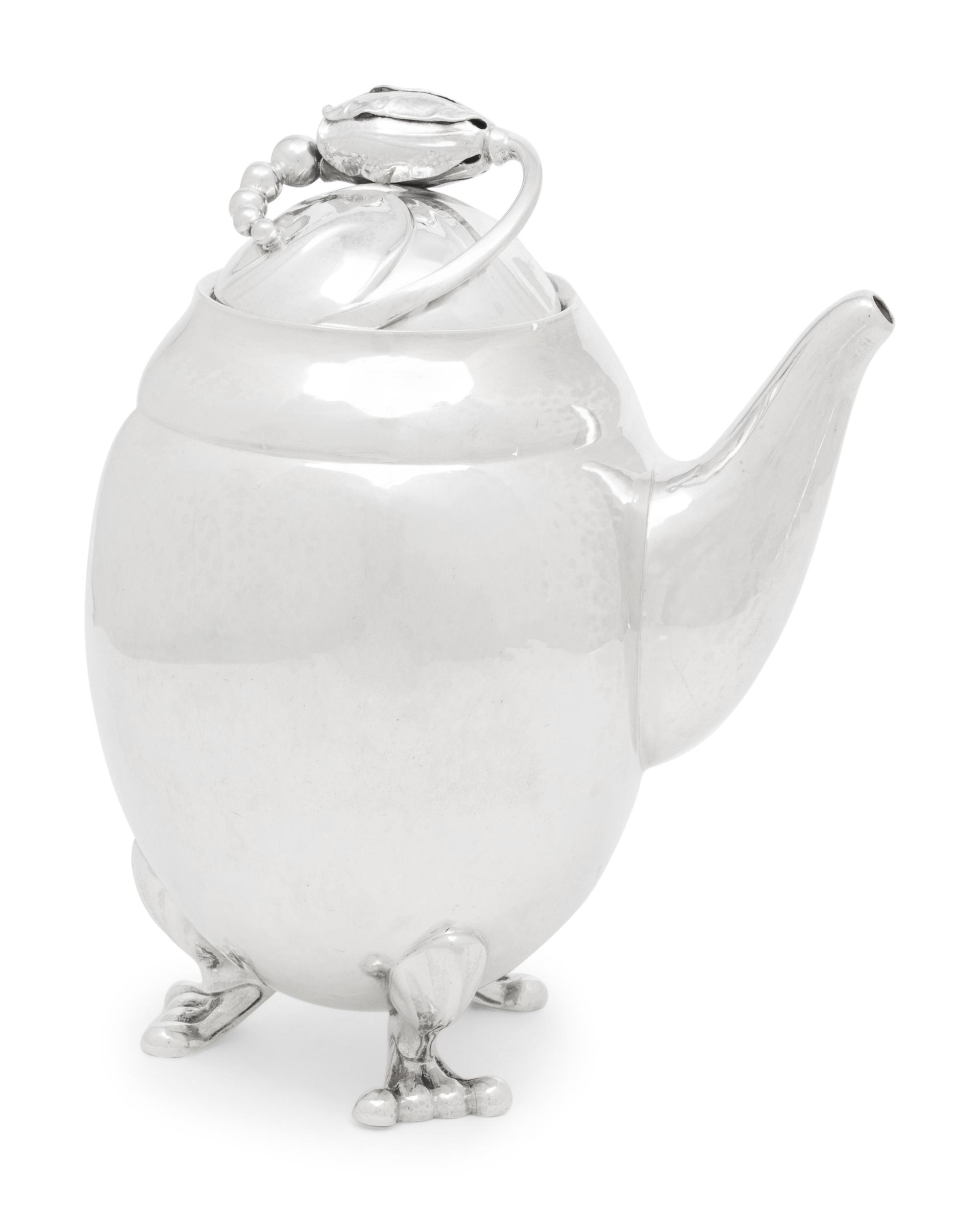A Georg Jensen Blossom Hammered Silver Chocolate Pot