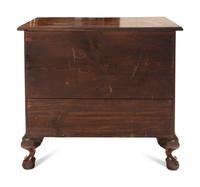 A Chippendale Carved And Figured Mahogany Serpentine Chest Of Drawers