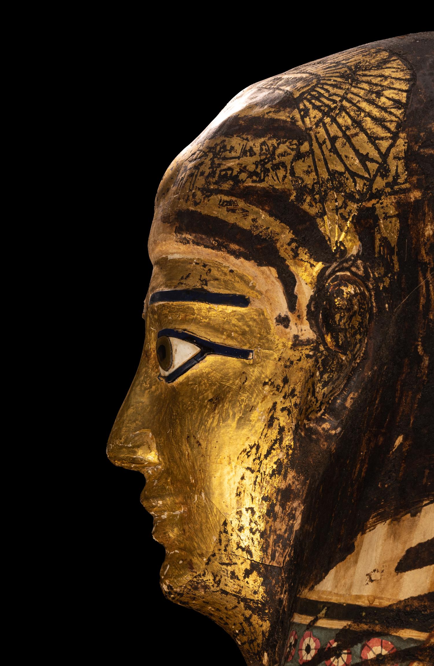 An Egyptian Gilt Cartonnage Mummy Mask