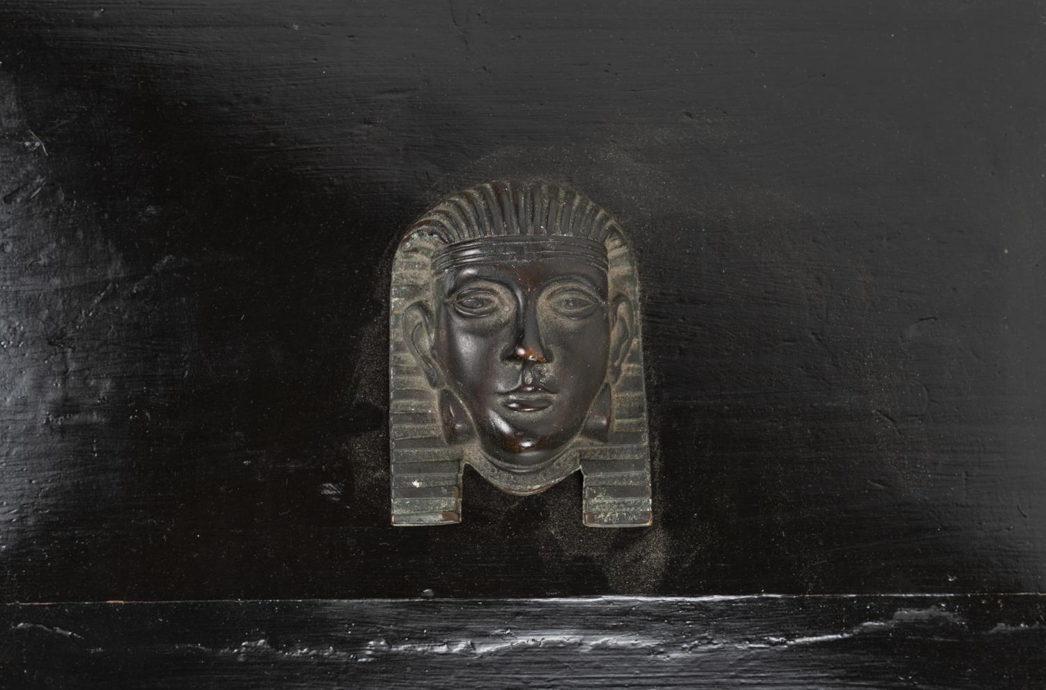 An Egyptian Revival Ebonized Coal Hod