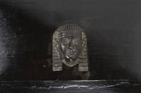 An Egyptian Revival Ebonized Coal Hod