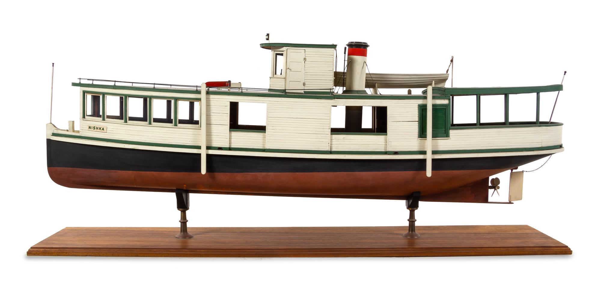 A Model of the "Nishka" Height of model 23 7/8 x length 58 inches.