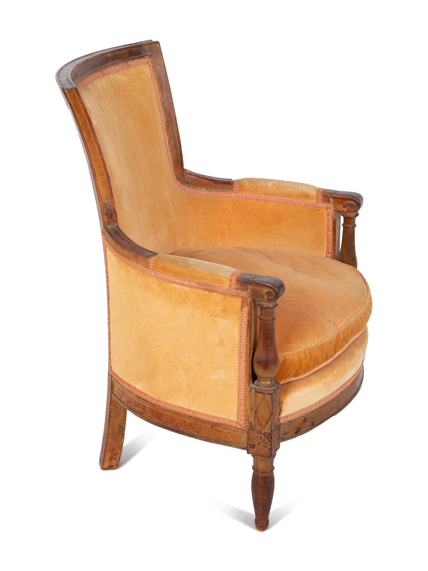 A Diminutive Directoire Carved Fruitwood Bergère — CIRCA 1790