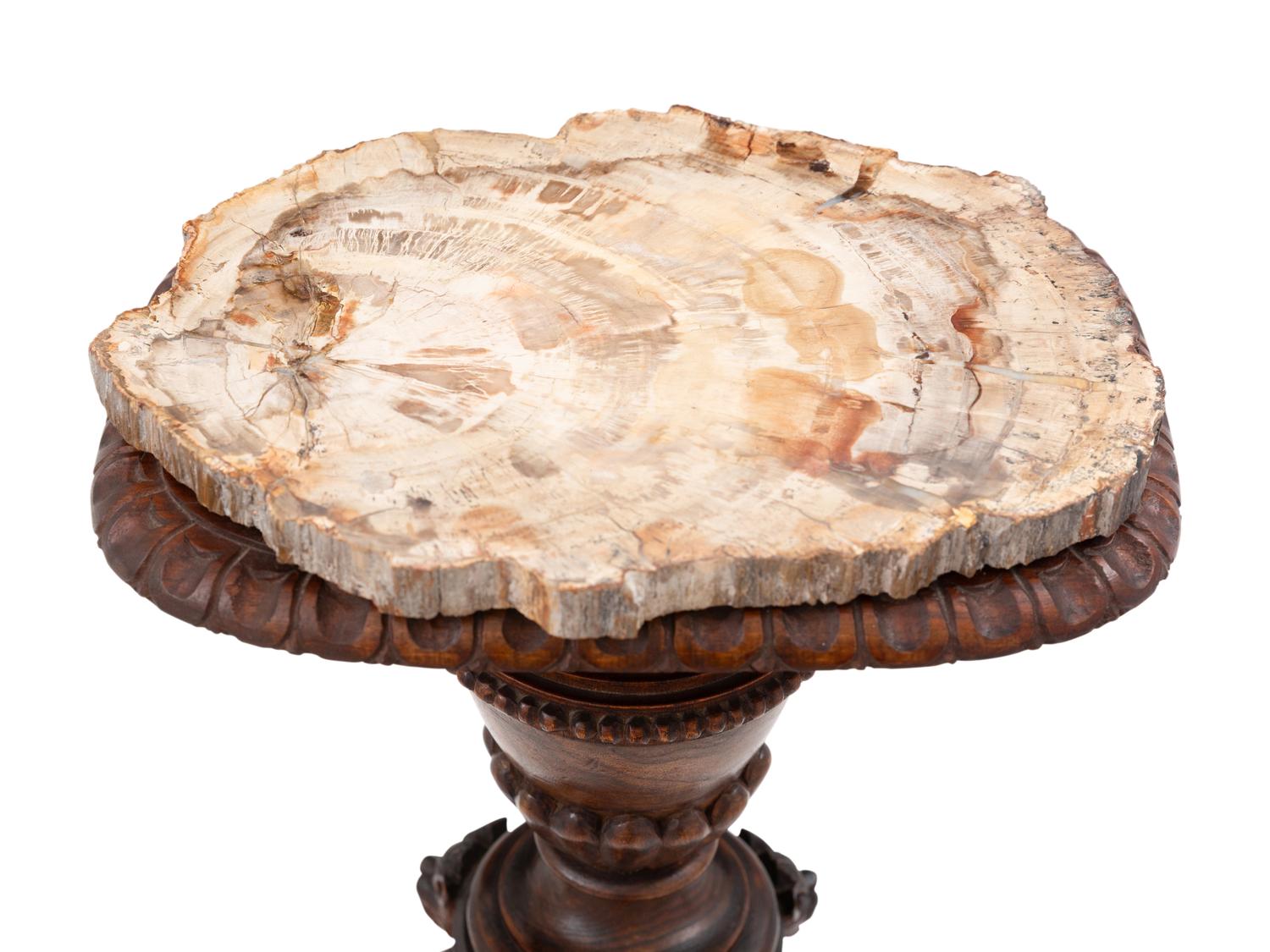 An Italian Carved Walnut Tripartite Pedestal