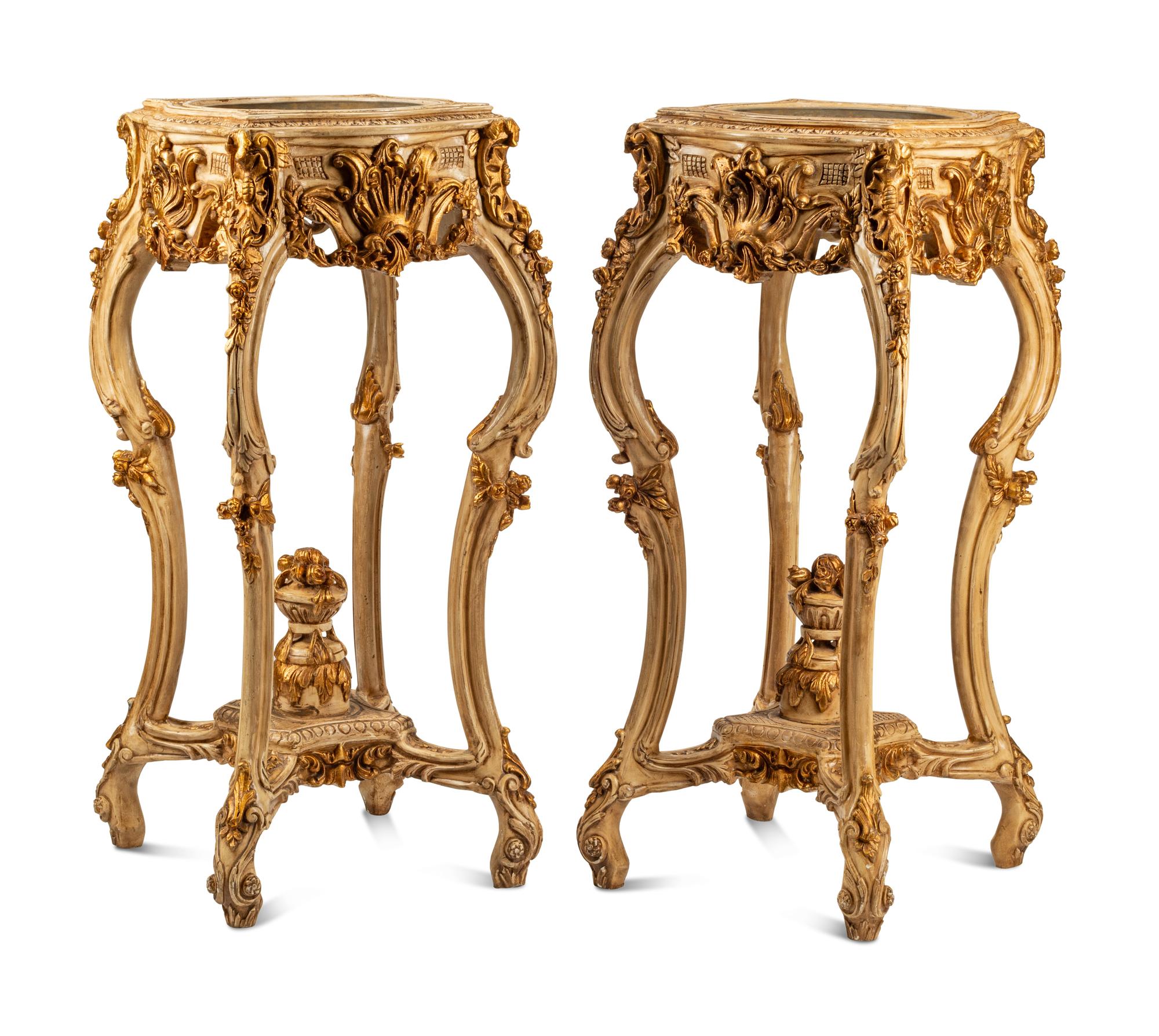 A Pair of Italian Painted and Parcel Gilt Jardinière Stands