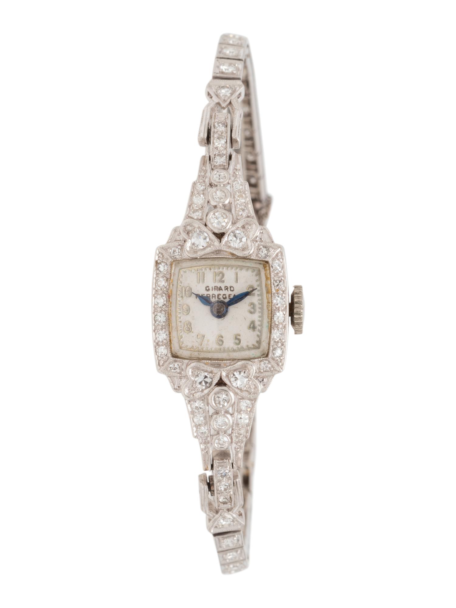 GIRARD PERREGAUX, PLATINUM AND DIAMOND WATCH