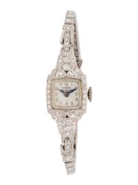 GIRARD PERREGAUX, PLATINUM AND DIAMOND WATCH