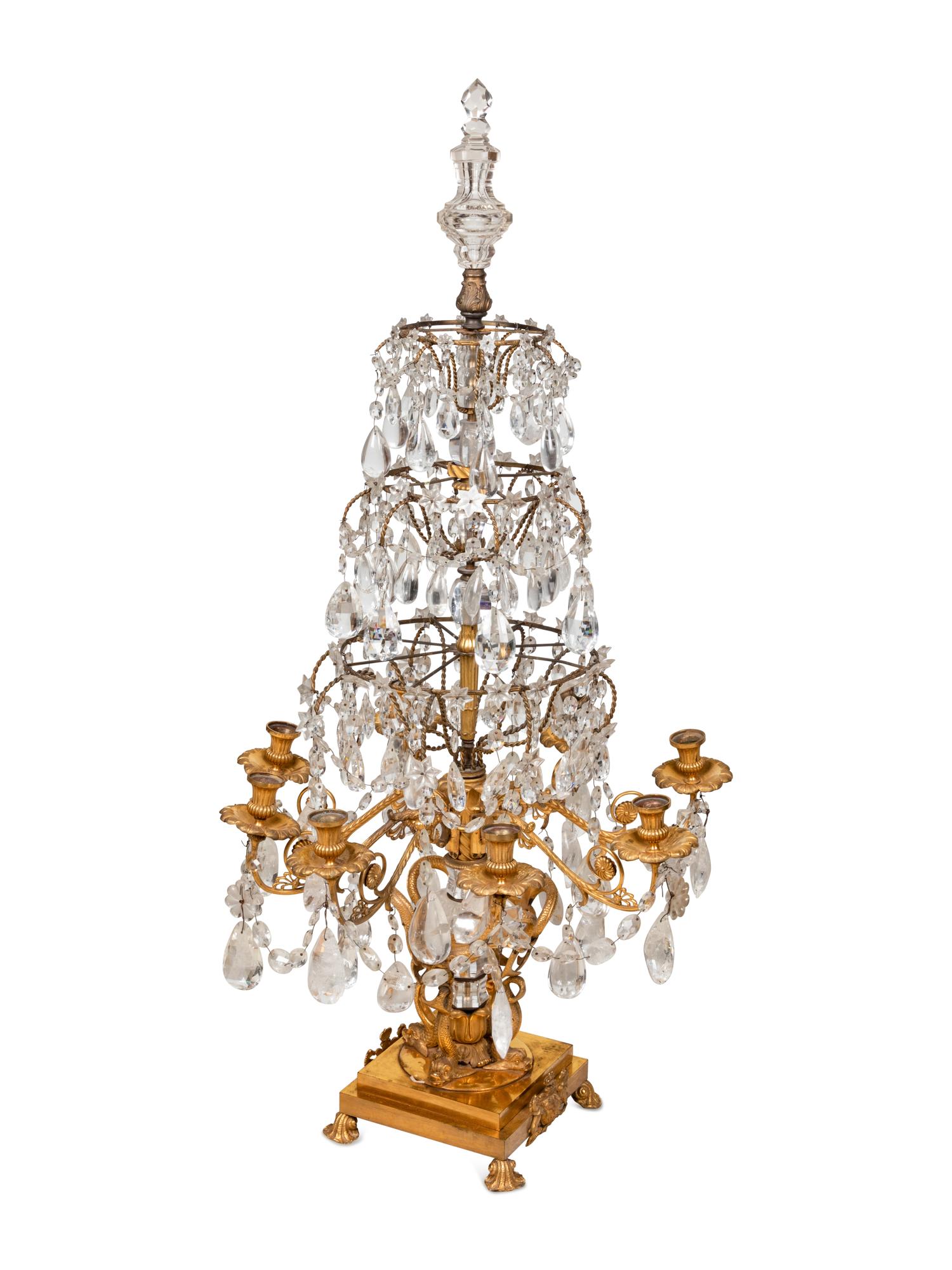 An Empire Style Four-Tier Gilt Bronze and Rock Crystal Eight-Light Girandole
