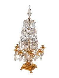 An Empire Style Four-Tier Gilt Bronze and Rock Crystal Eight-Light Girandole