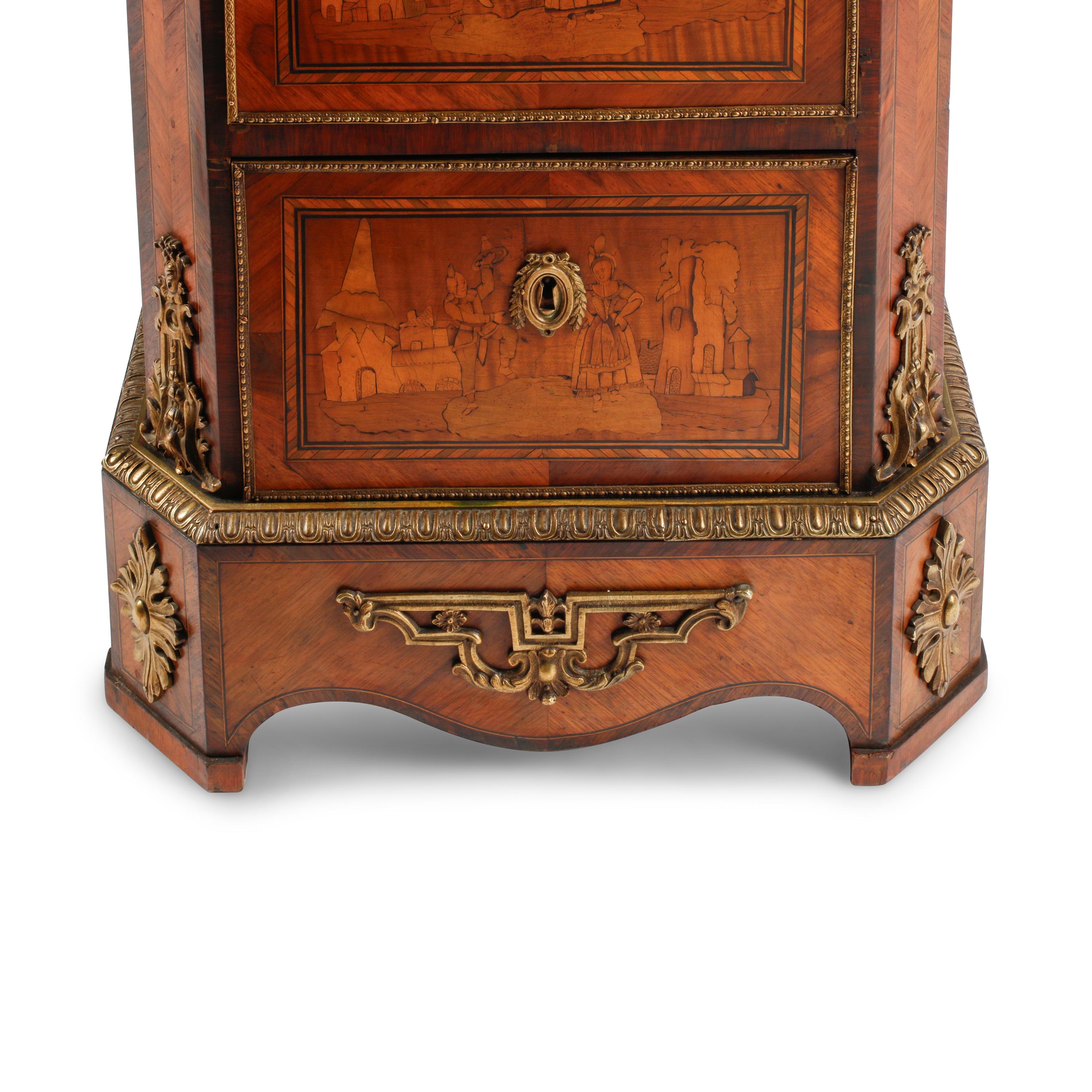 A Louis XVI Style Gilt Metal Mounted Marquetry Tall Chest of Drawers