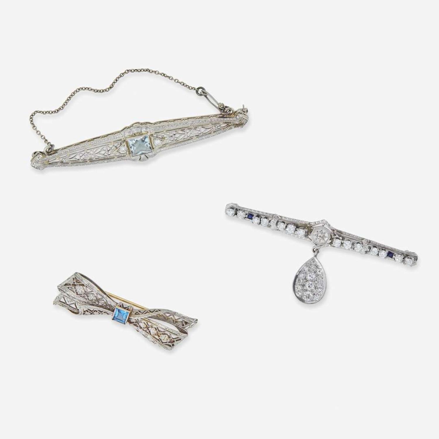 A Collection of Art Deco 14K White Gold Brooches
