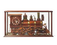 A brass-fitted mahogany 1886 steam locomotive / train fitted with clock, made by R. Davidson, April 10, 1910, works by Waterbury Clock Co.