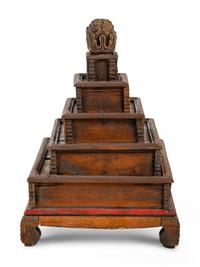 A Mongolian Gilt and Red Lacquered Carved Wood Stand