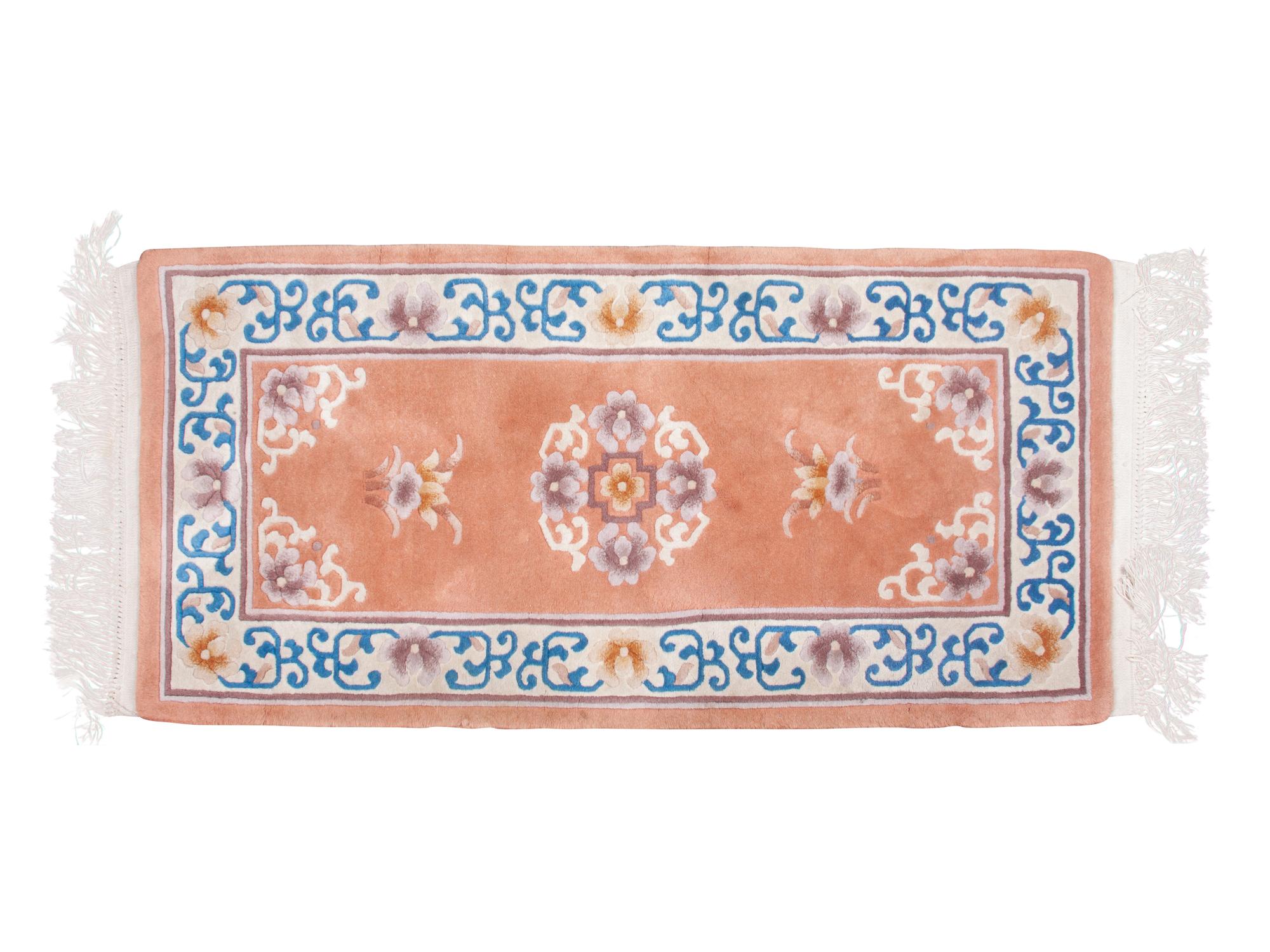 A Chinese Wool and Silk Peach Rug
