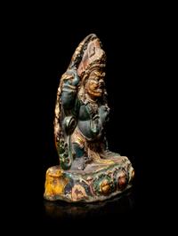 A Tibetan Polychrome Lacquered Figure