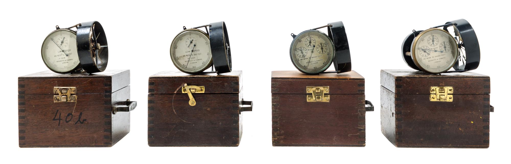A Group of Four English Black Lacquer Airmeters Diameter of turbines 3 inches. — NEGRETTI & ZAMBRA, LONDON, EARLY 20TH CENTURY