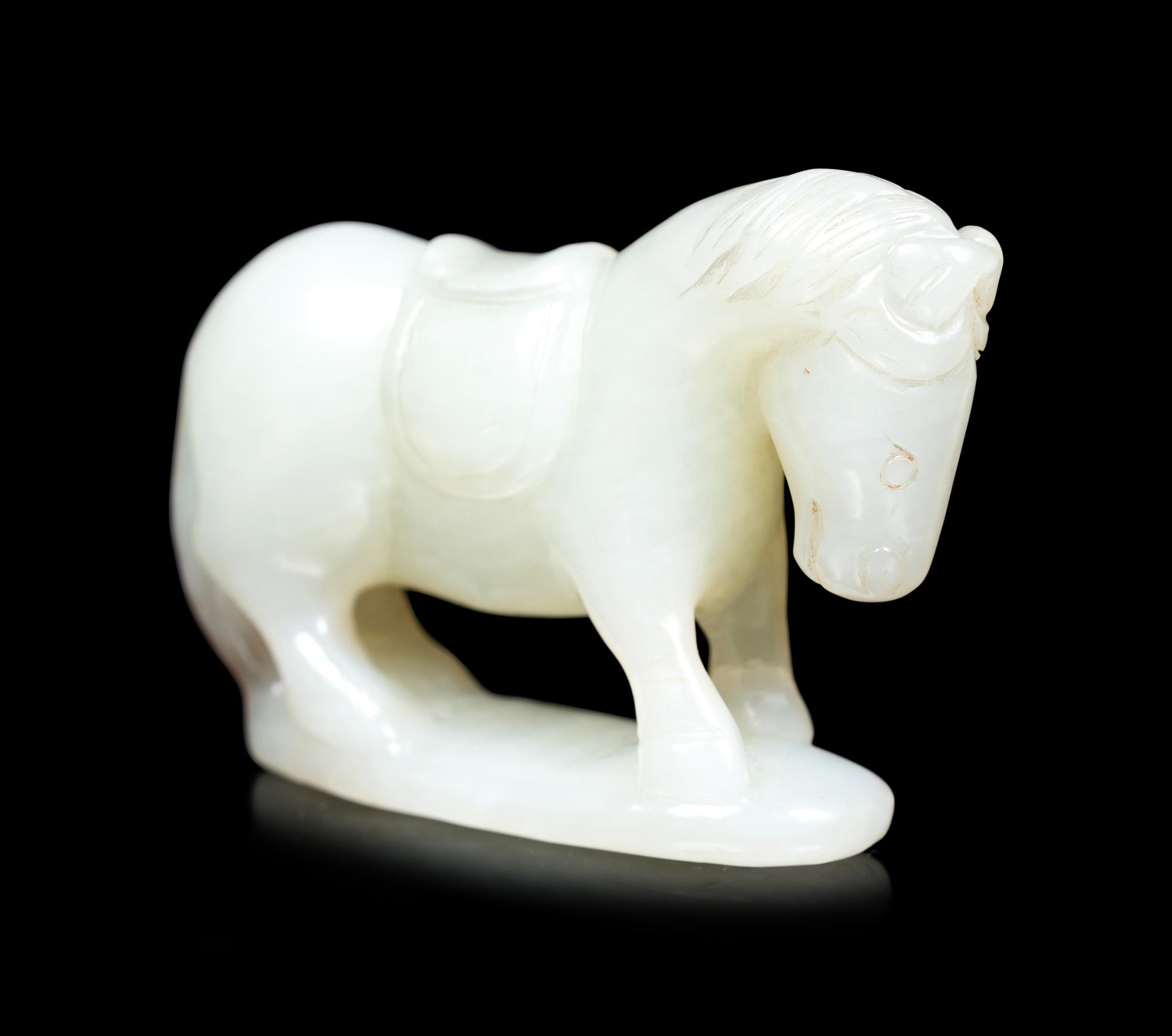 Four Chinese Pale Celadon Jade Carvings