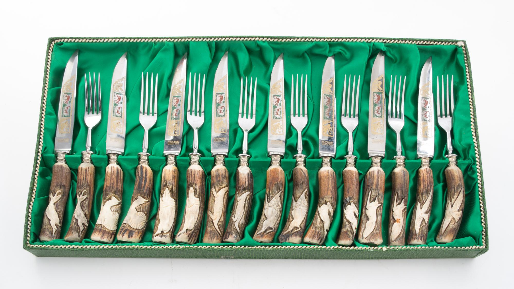 A Continental Steak Knife and Fork Service Length of knife 8 5/8 inches.