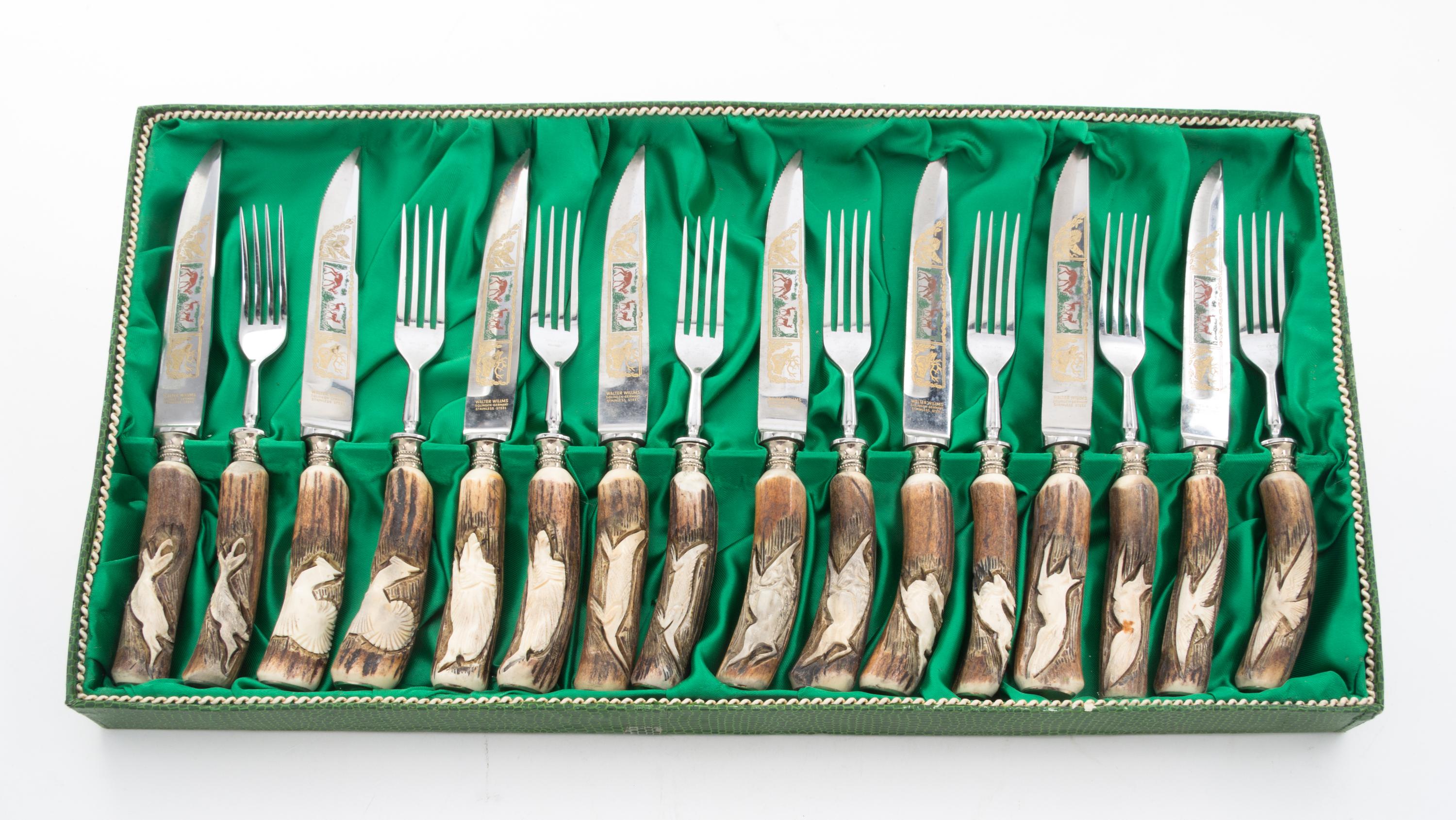 A Continental Steak Knife and Fork Service Length of knife 8 5/8 inches.
