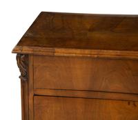 A Continental Walnut Chest of Drawers