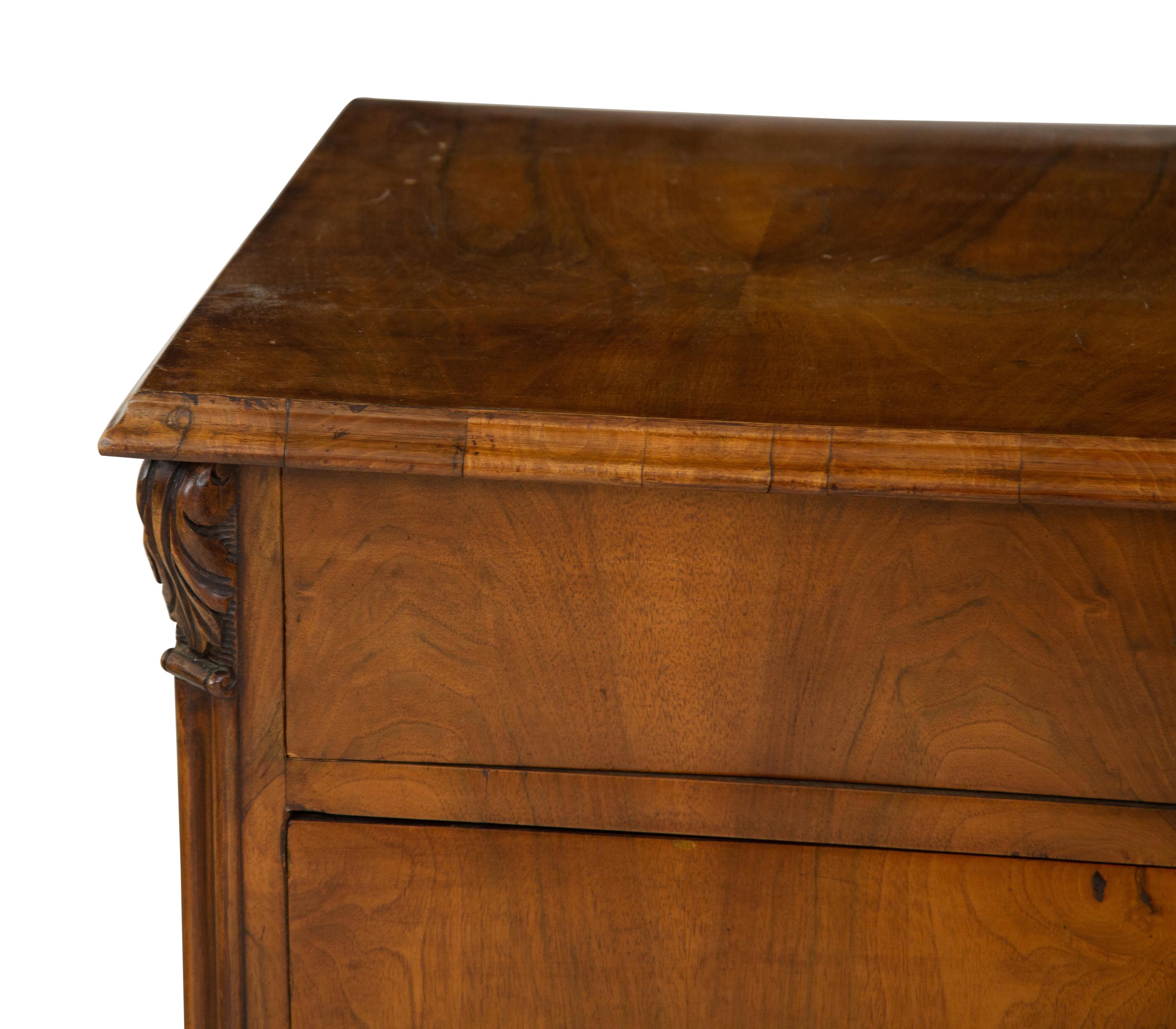 A Continental Walnut Chest of Drawers