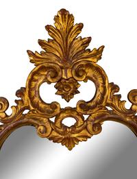 A Louis XV Style Carved Gilt Wood Mirror — EARLY 20TH CENTUR