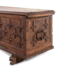 A Continental Carved Walnut Cassone