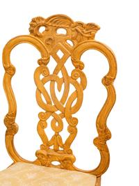 A Set of Twelve Venetian Style Painted Dining Chairs