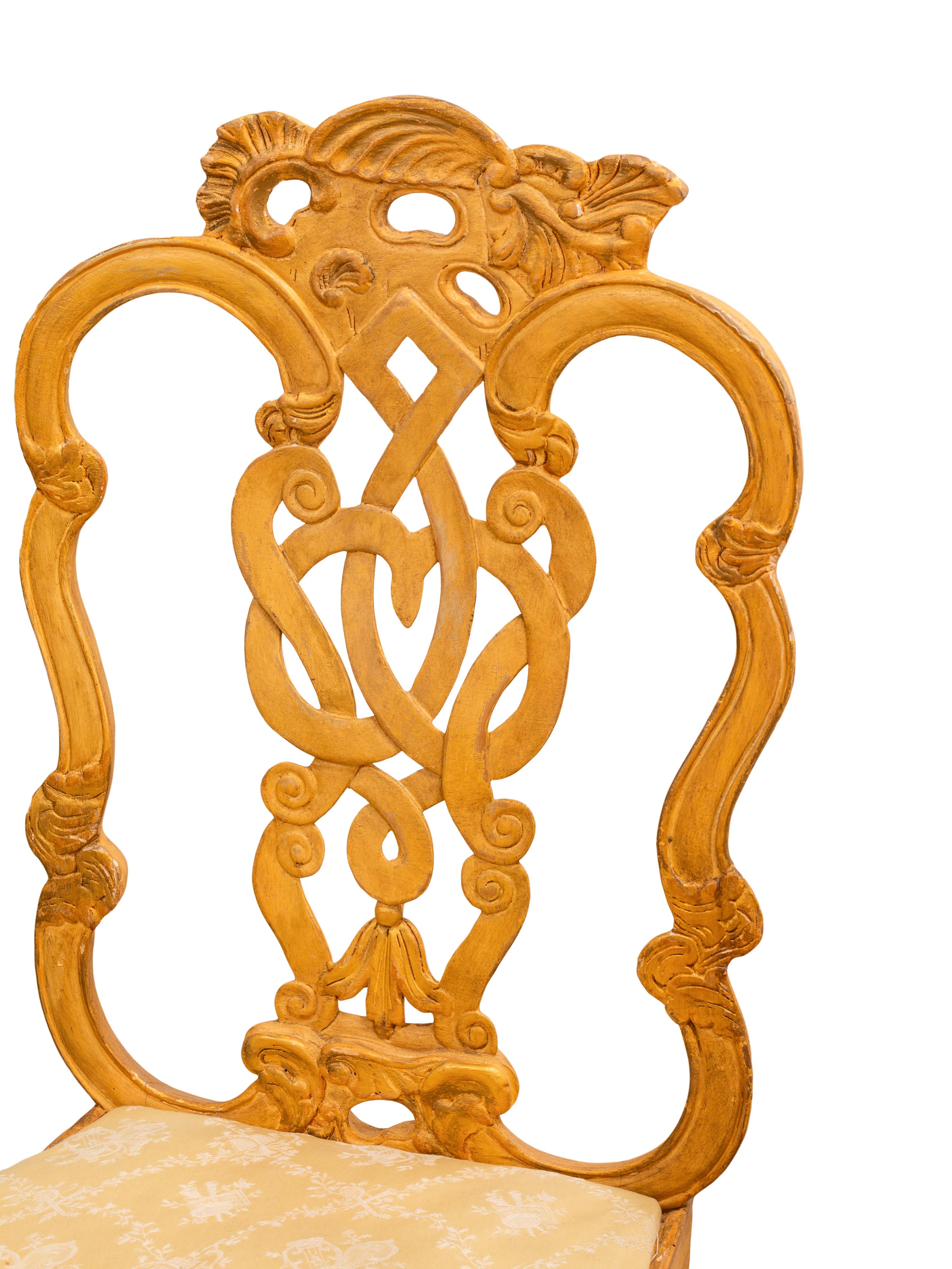 A Set of Twelve Venetian Style Painted Dining Chairs