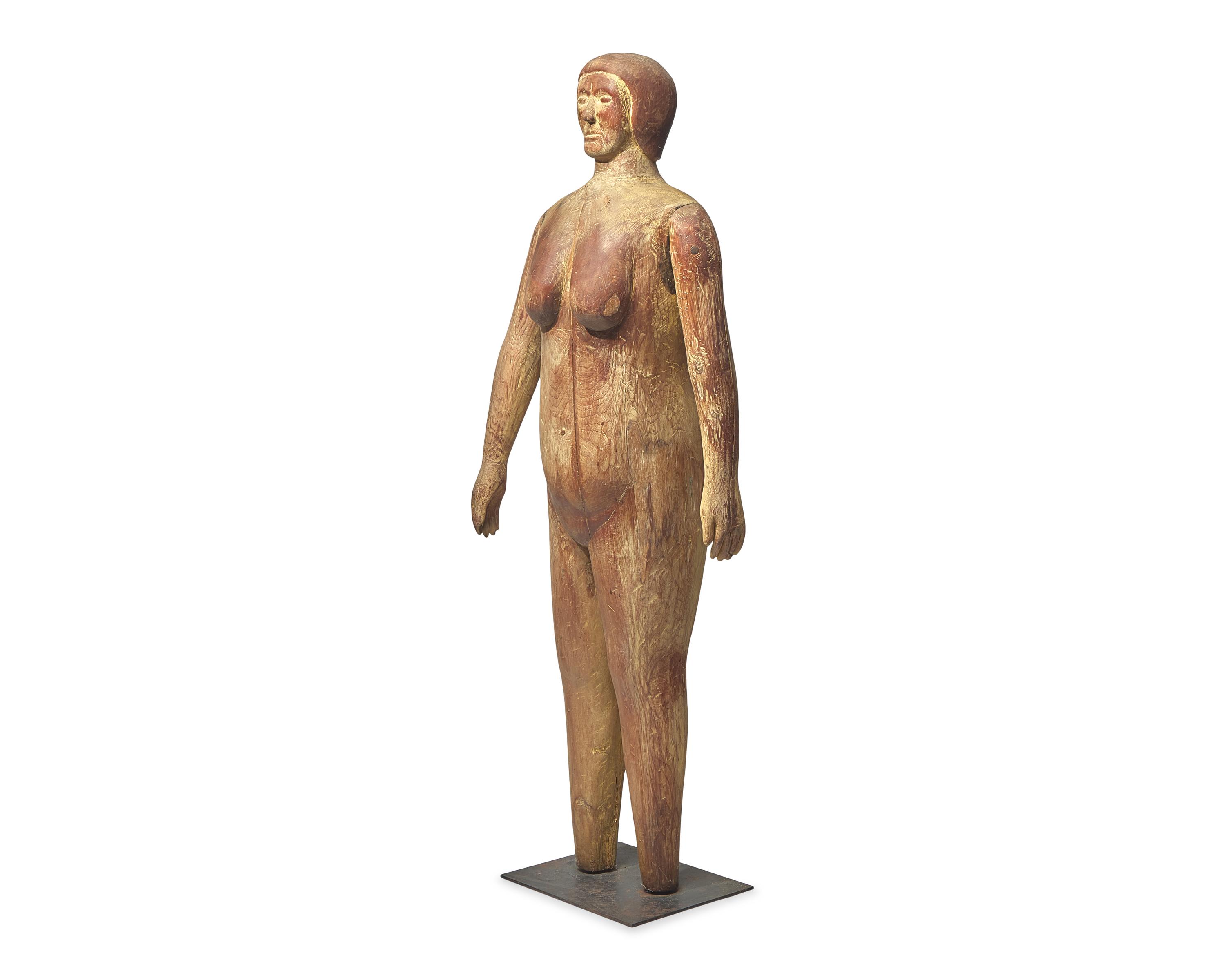 A Life-Size Carved Pine Figure of a Woman